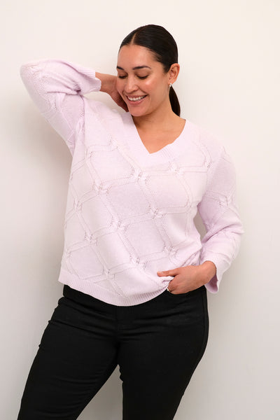 Lyserød pullover med V-hals