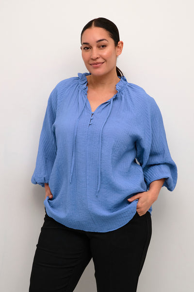 Bluse med ballonærmer