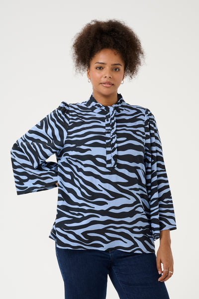 Zebra print bluse med lange ærmer