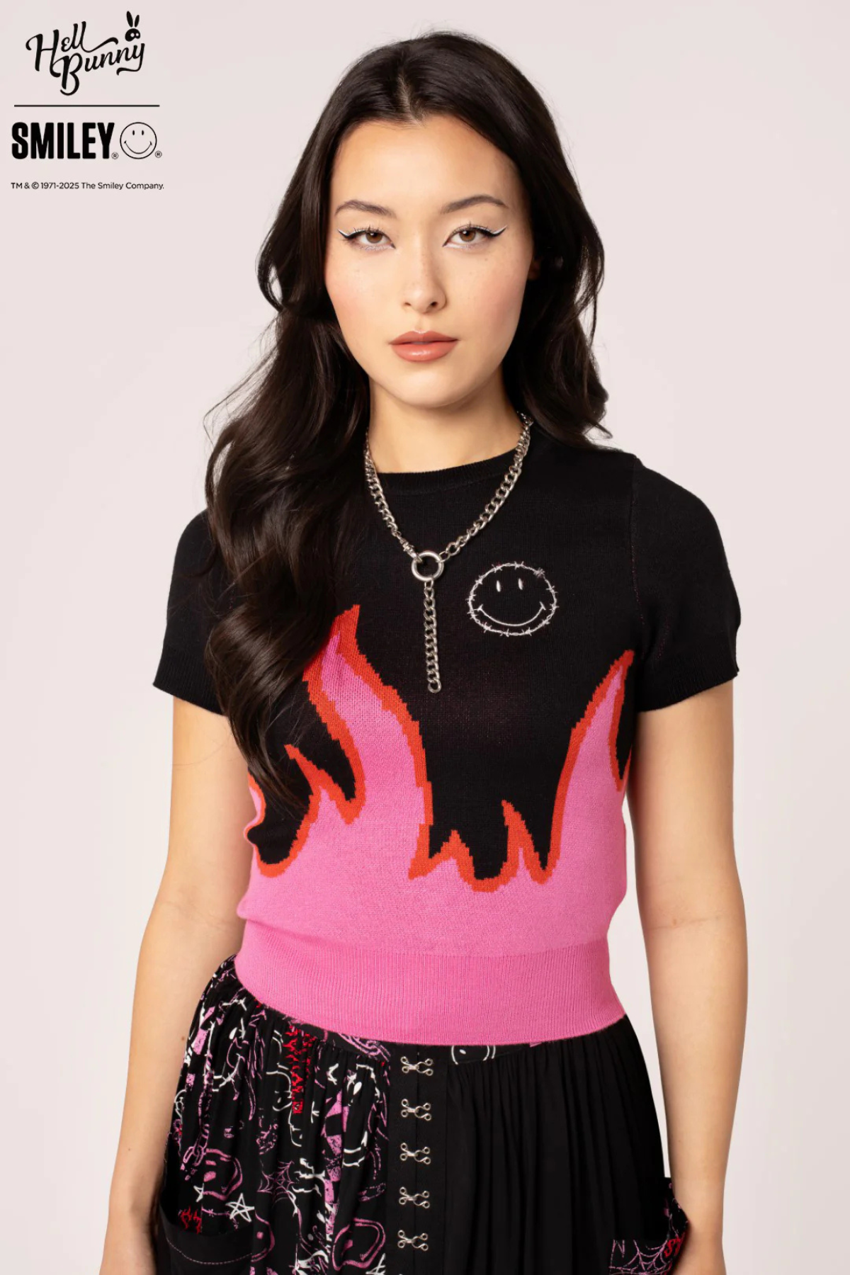 Dylan Top – Sort strik med pink flammer & Smiley®-broderi