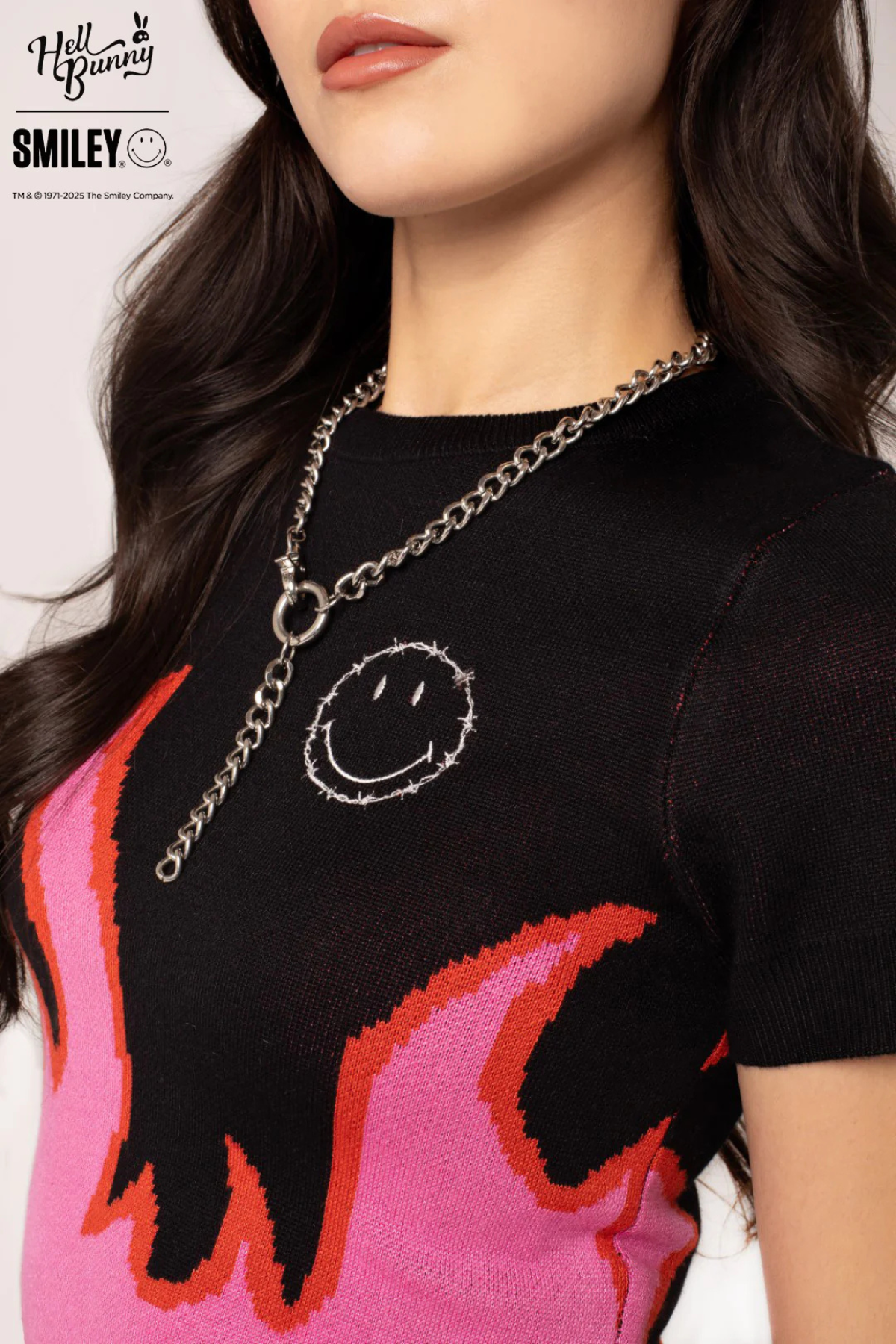 Dylan Top – Sort strik med pink flammer & Smiley®-broderi