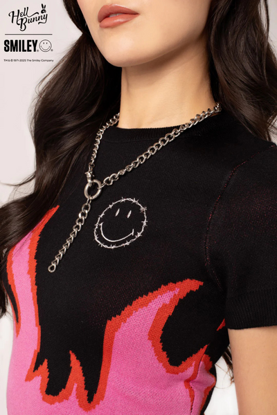 Dylan Top – Sort strik med pink flammer & Smiley®-broderi