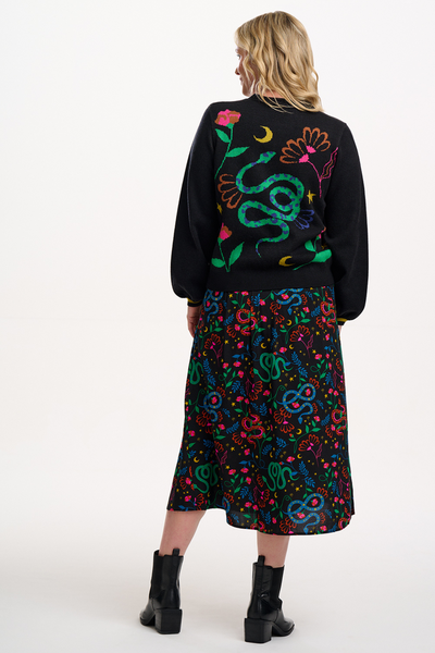 Rosalind Skirt bagfra – sort nederdel med farverige slanger, blomster og stjerner