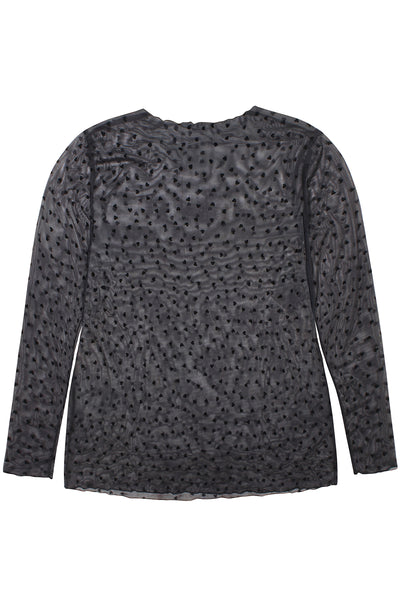 Bagside af Tora Mesh Bluse med små sorte hjerter, mod hvid baggrund