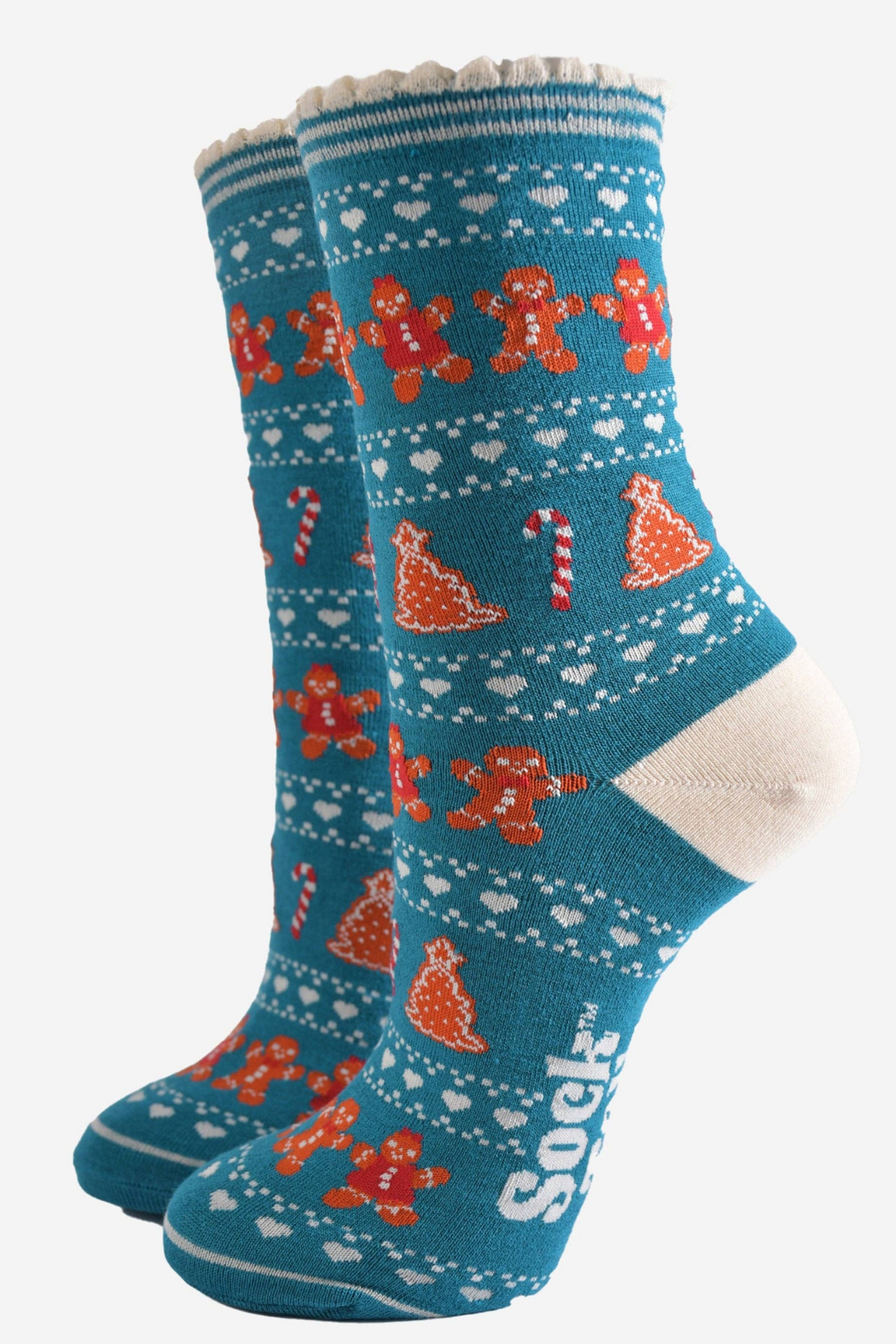 Blå bambusstrømper med honningkagemænd og slikstokke fra Sock Talk