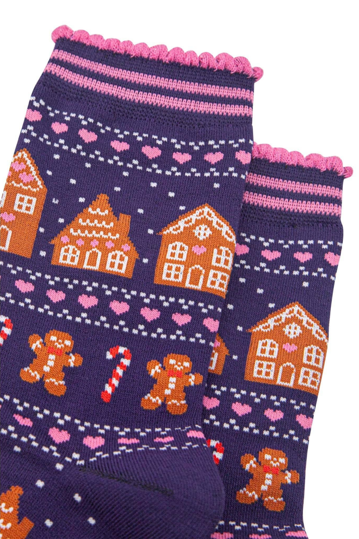 Detalje af bambusstrømper med honningkagehuse og lyserøde hjerter